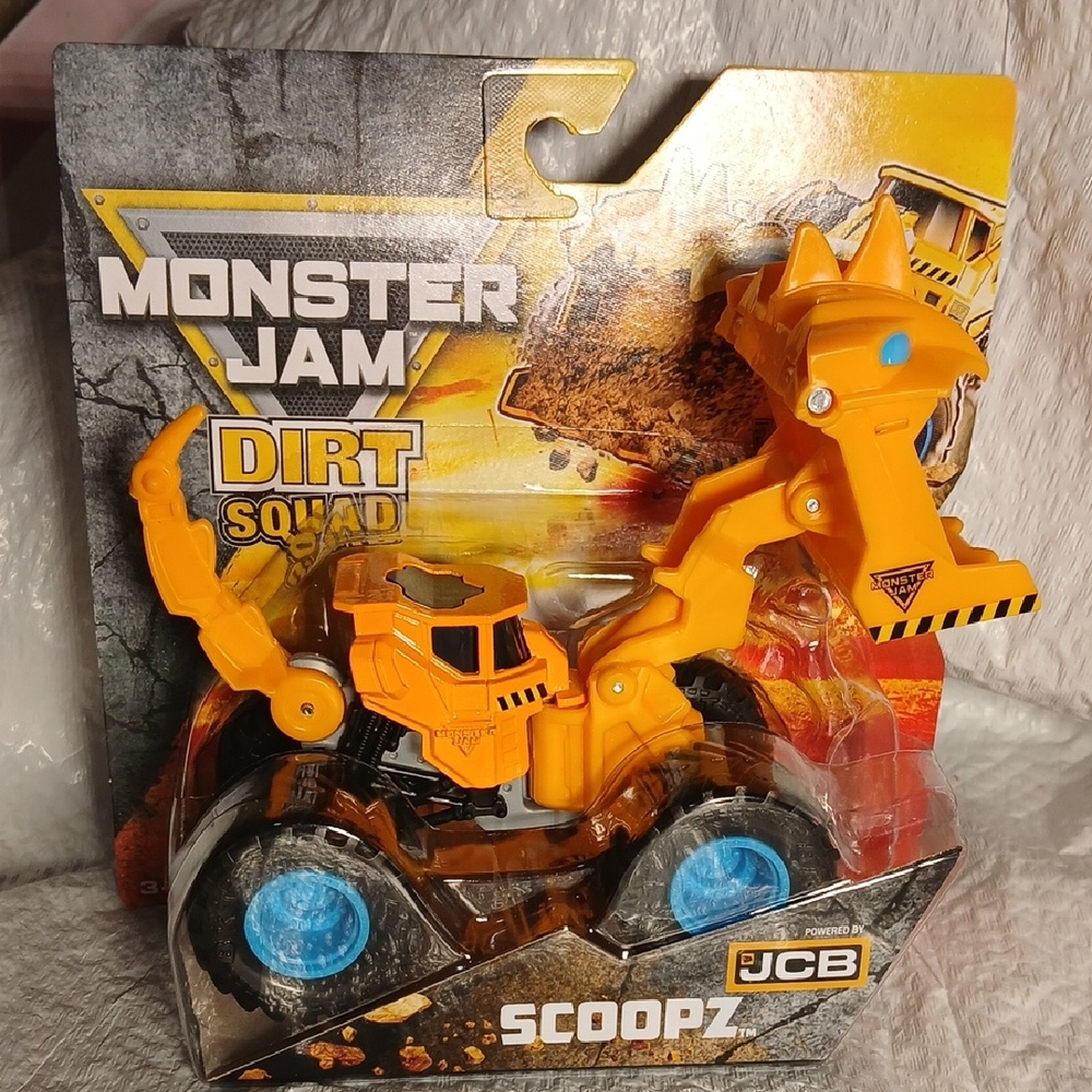Monster Jam JCB Dirt Squad Scoopz - Orange With  Blue Wheels
